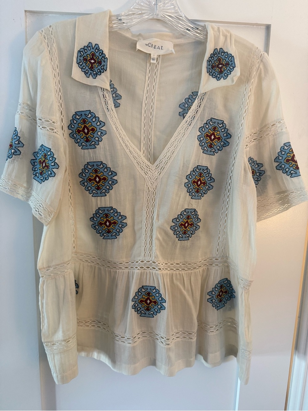 THE GREAT. Cream Tunic with Blue & Red Embroidered Medallions